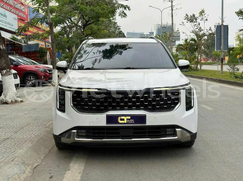 Big with watermark kia carnival tinh lam gjong gjam rong 39021