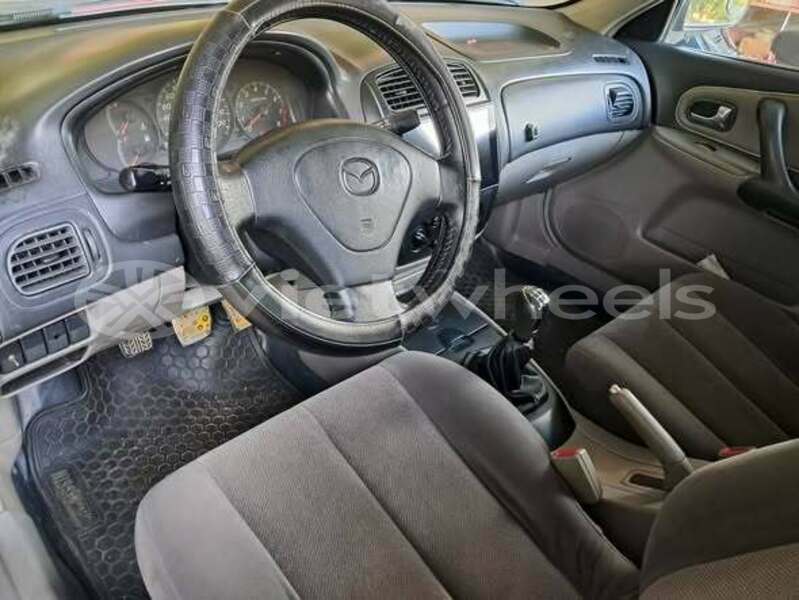 Big with watermark mazda 323 hanoi an giang 49160