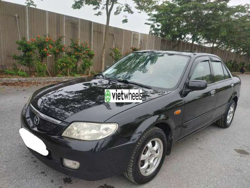 Big mazda 323 an giang huyen an phu 2081